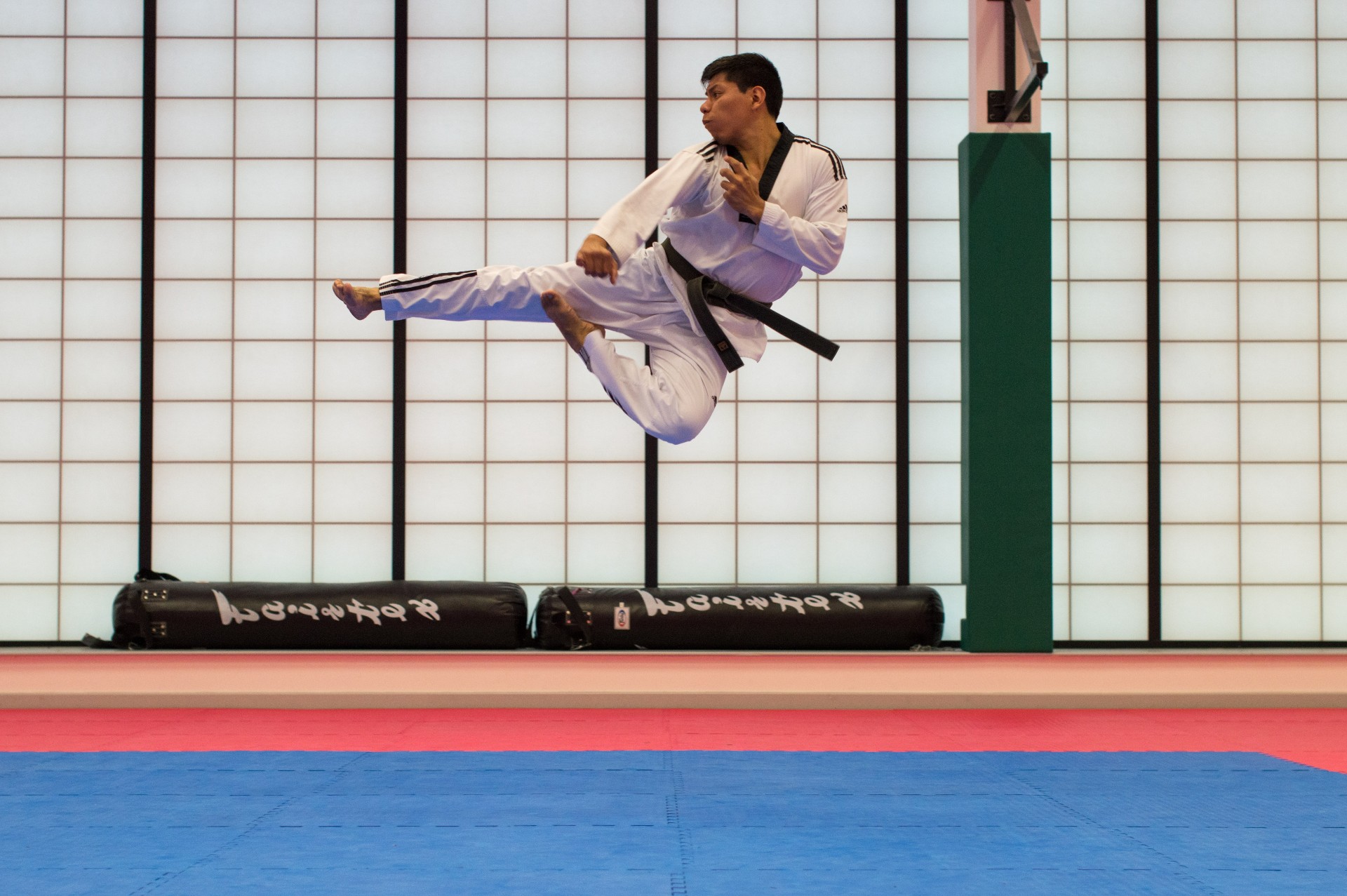 man performing flying kick